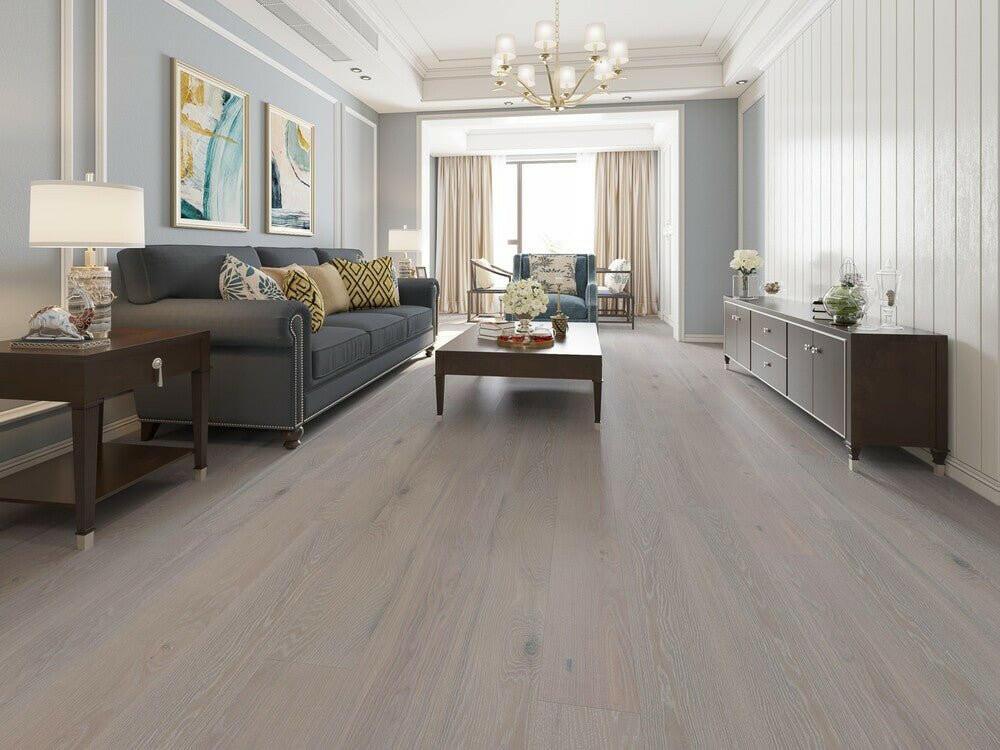 A modern living room which displays the beautiful look of Silver Stone premium engineered hardwood flooring from Vidar.