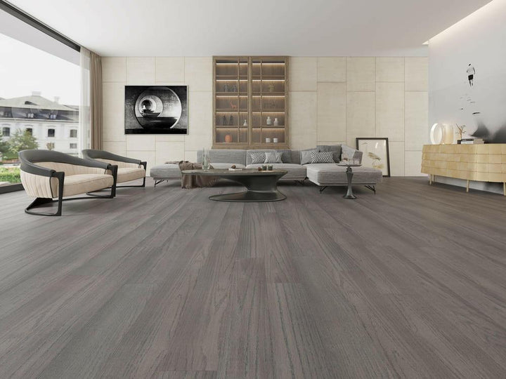 A modern room which displays the beautiful look of Smoke Grey premium engineered hardwood flooring from Vidar.