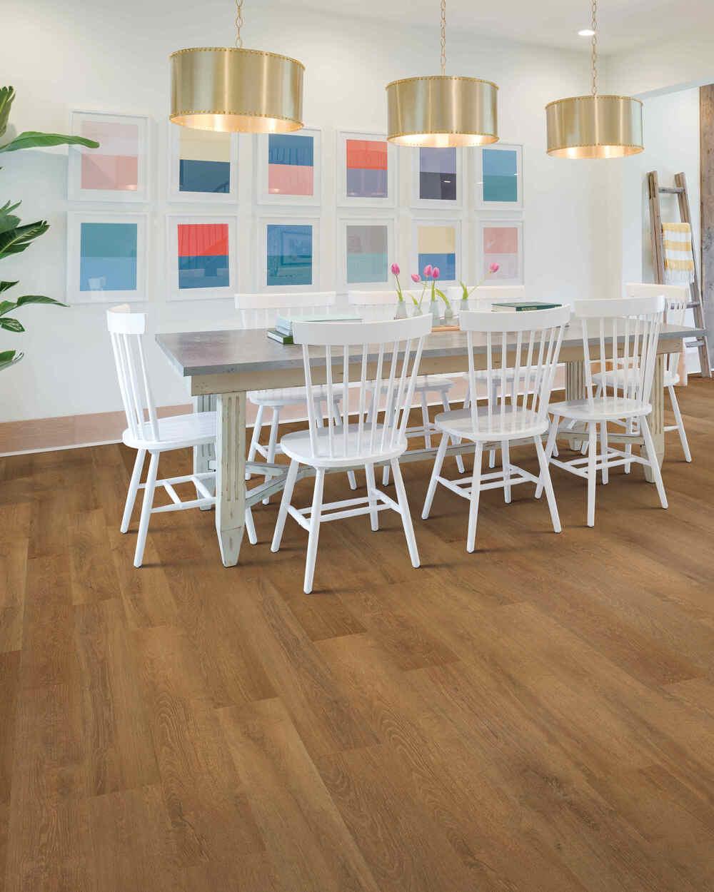 Modern kitchen with Stormy Sands from Mohawk SolidTech Explorer's Cove luxury vinyl plank 5mm installed.