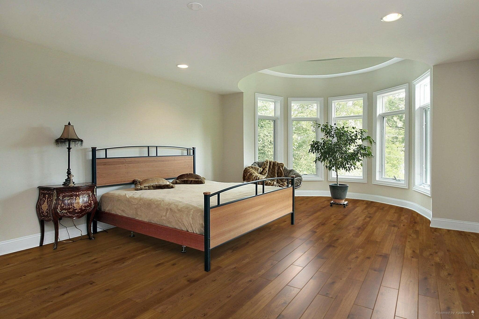 A modern bedroom which displays the beautiful look of TF1108-F Toucan 12mm laminate flooring.
