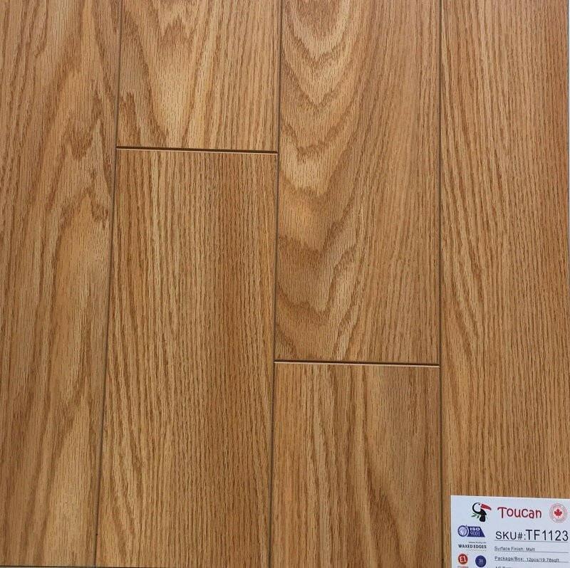 A close up of TF1123-F 12mm laminate flooring from Toucan.