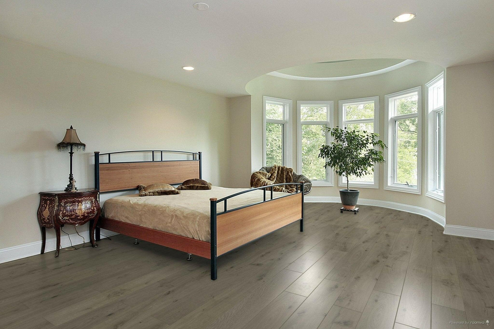 A modern bedroom which displays the beautiful look of TF6019-F Toucan 12mm laminate flooring.
