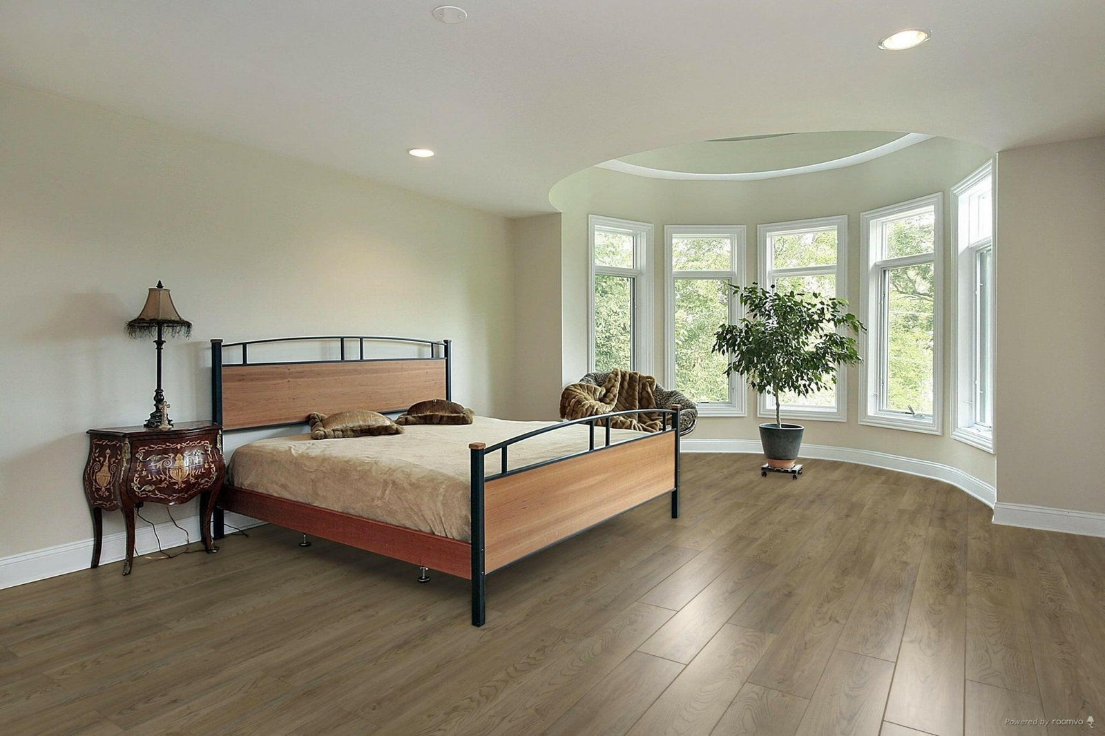 A modern bedroom which displays the beautiful look of TF6206-F Toucan 12mm laminate flooring.