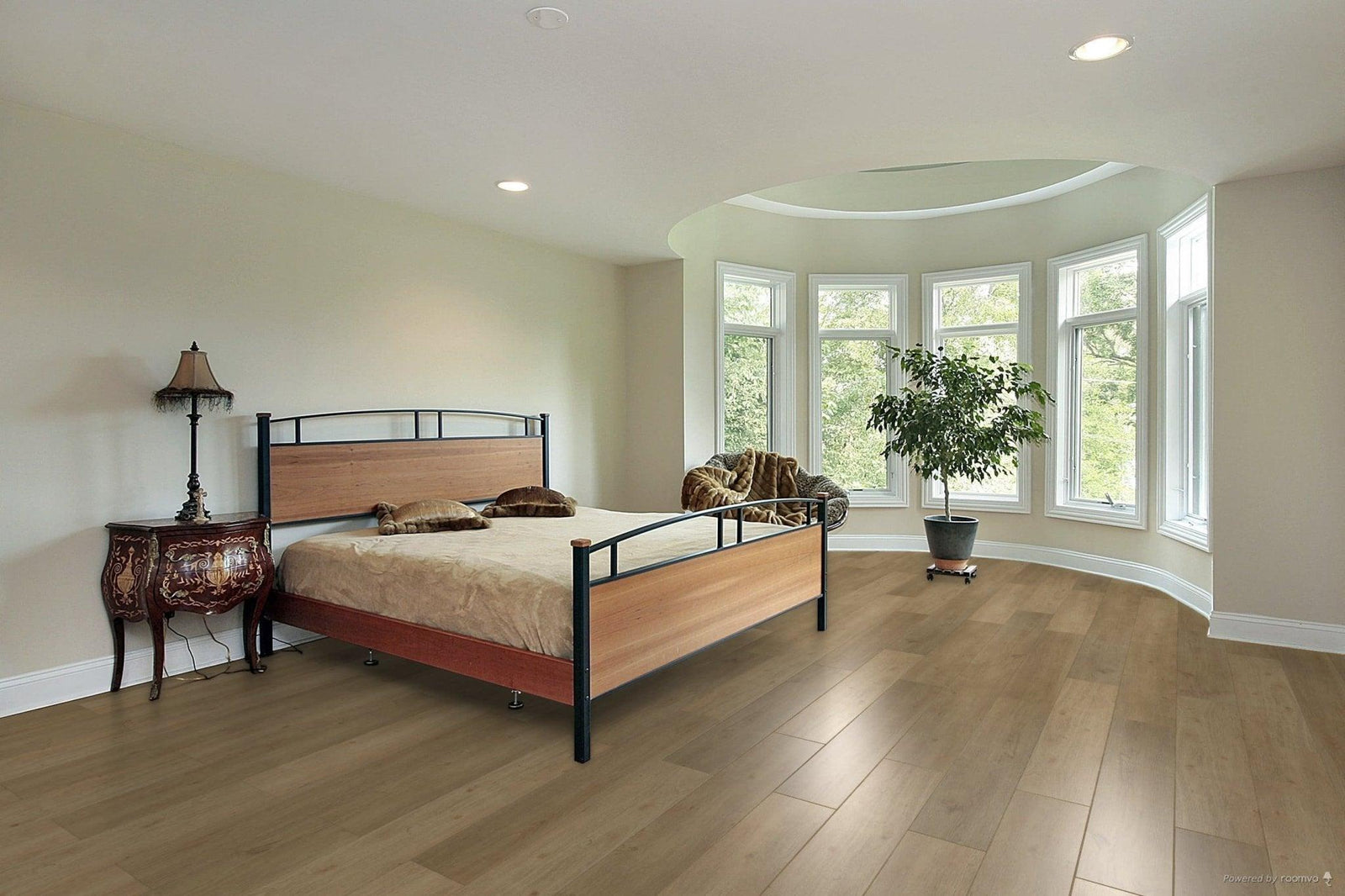 A modern bedroom which displays the beautiful look of TF6307-F Toucan 12mm laminate flooring.
