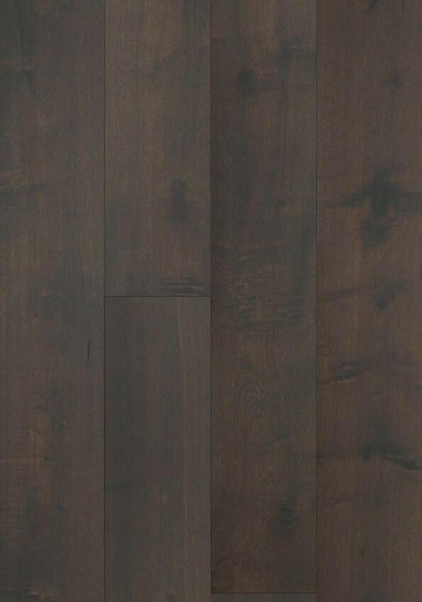 A close up of Warm Onyx BRAND SURFACES premium 7-½” engineered hardwood flooring from Canadian Standard.