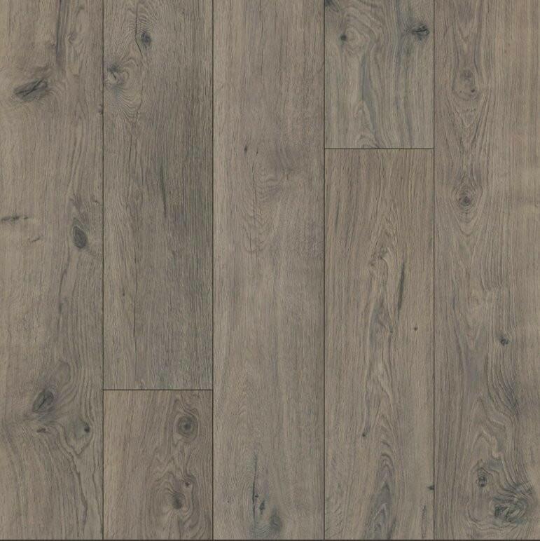 Close up of Waterproof Laminate in the colour Wickham Gray Oak by Mohawk RevWood sold by Advanced Flooring in Kitchener-Waterloo.